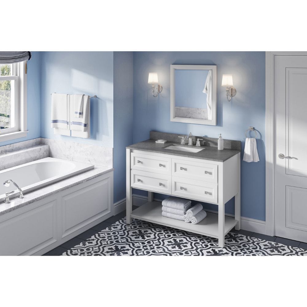 The Adler vanity features an open cabinet, full-extension drawers, and tipout trays to accentuate the bath with storage solutions.