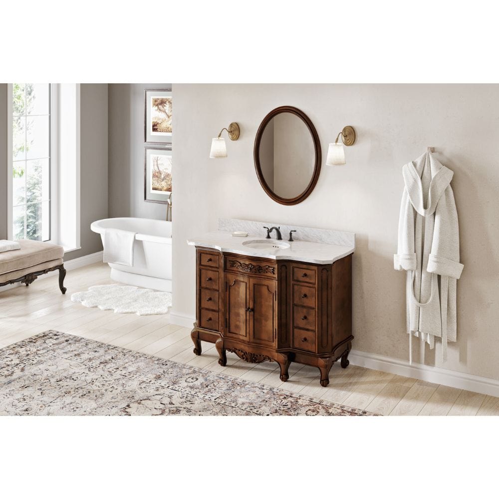 Carved floral onlays and French scrolled legs add sophistication to our Clairemont vanities. Ample storage is provided by a large cabinet for towels and linens and four soft-close drawers on either side of the cabinet.