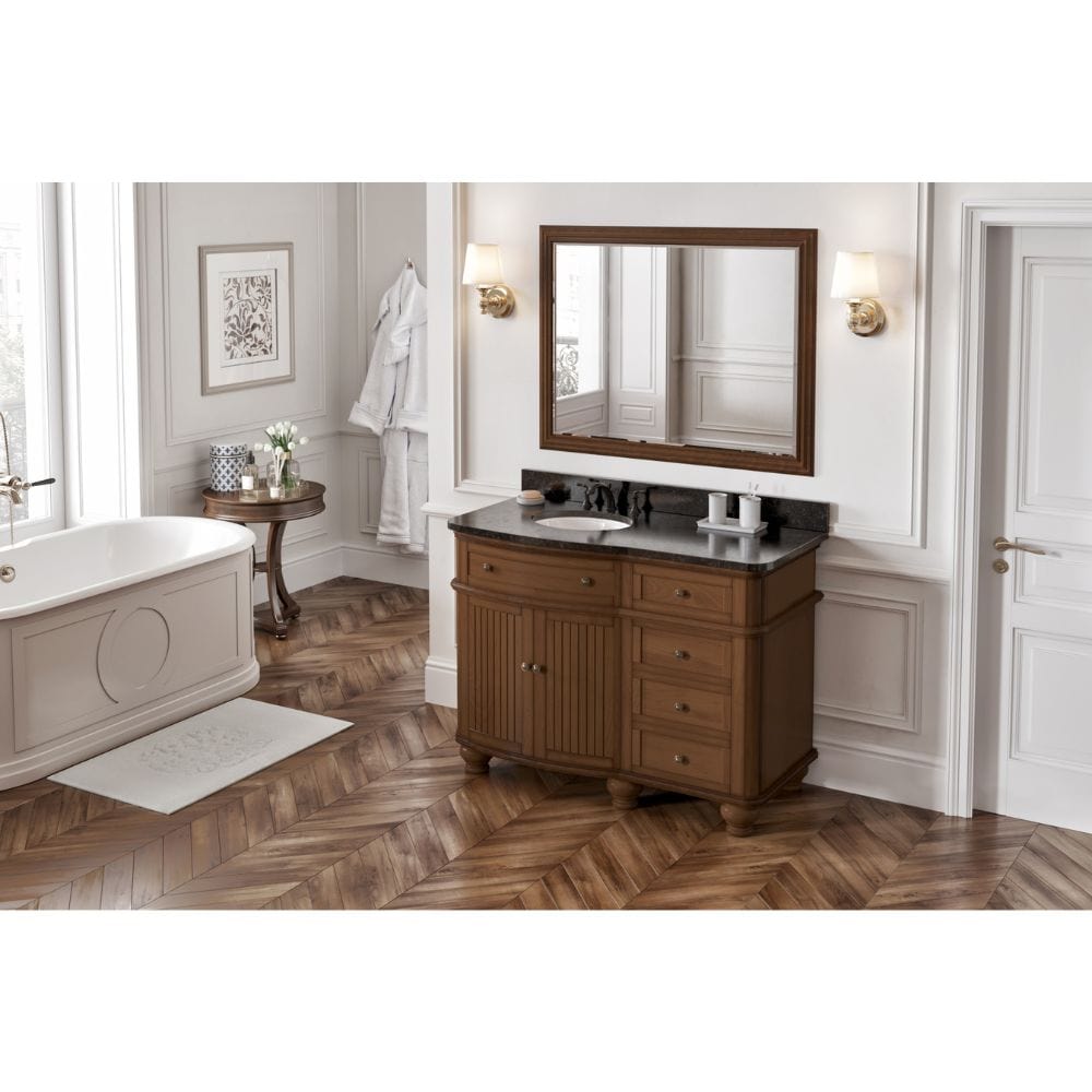 Simple beadboard doors, curved bun feet, and a rounded front form this cottage-style vanity collection. 