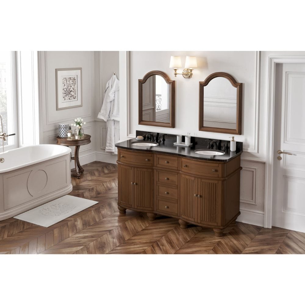 Simple beadboard doors, curved bun feet, and a rounded front form this cottage-style vanity collection.