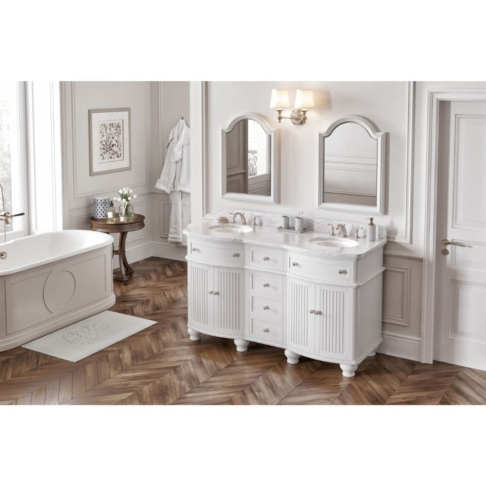 Simple beadboard doors, curved bun feet, and a rounded front form this cottage-style vanity collection.